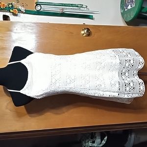 Timing dress size small white lace overlay on top of white lining